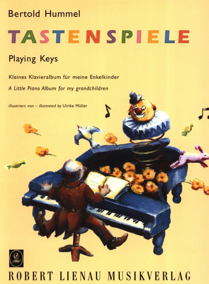 A yellow, colourfully illustrated music book cover featuring a clown, a toy train and flowers, with the title ‘Bertold Hummel, Tastenspiele – Playing Keys, A Little Piano Album for My Grandchildren, illustrated by Ulrike Müller’, Robert Lienau Musikverlag